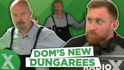 Dom tries on dungarees! image