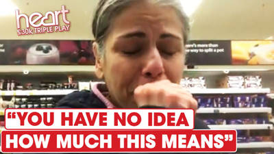 Watch as Neera finds out she's won £30,000 while in the supermarket! image