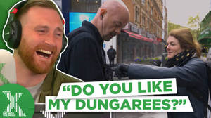 Dom tests out his dungarees in Leicester Square image