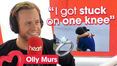 Olly Murs revealed fiancé Amelia Tank had to 'help him up' when he proposed image