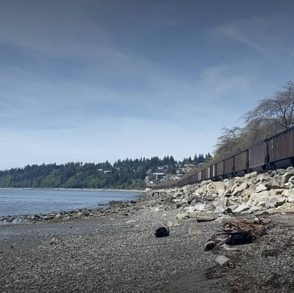 Freight train and waves, White Rock Beach, B.C., Canada on 15th May 2024 – by Martin Zaltz Austwick