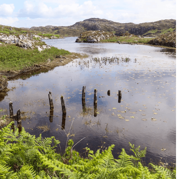 108. Take a boat adventure onto a beautiful loch in wild and rugged Assynt, Scotland