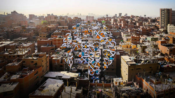 A project of peace, painted across 50 buildings | eL Seed
